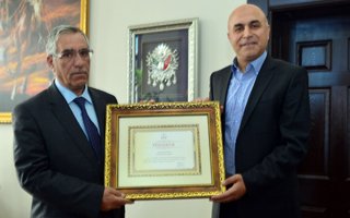 Başkan Ali Korkut'a Bakanlık'tan Plaket